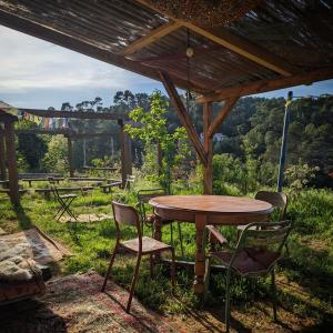 Zahrada ubytování Maison organique à la mauvaise herbe