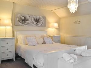 Postel nebo postele na pokoji v ubytování Penlan Cottage
