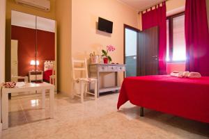 A bed or beds in a room at B&B Tifeo