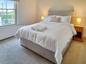Una cama o camas en una habitación de Crimple Brow