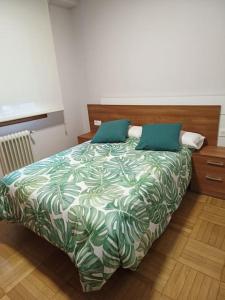 Ένα ή περισσότερα κρεβάτια σε δωμάτιο στο Vivienda Arias