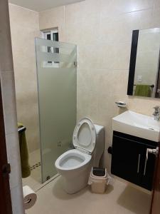 Koupelna v ubytování Confortable Apartamento + 3 fotografie