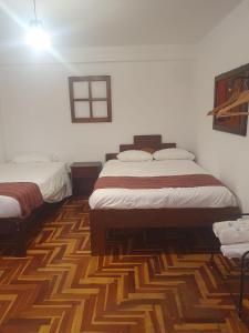 Katil atau katil-katil dalam bilik di shanti pisac