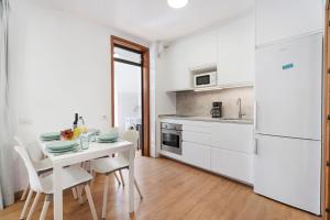 Kuchnia lub aneks kuchenny w obiekcie Family Duplex Altamira Playa Las Americas Tenerife South