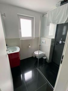 Koupelna v ubytování Cozy Escape House - 12 min to Zurich HB - Free Parking