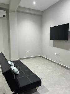 Bellazio Aparthotel TV 또는 엔터테인먼트 센터