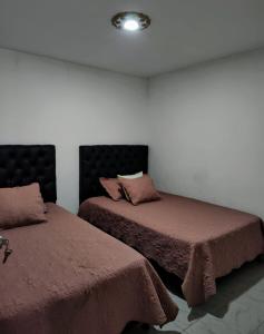 Ліжко або ліжка в номері APARTAMENTO VACACIONAL