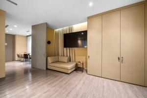 TV a/nebo společenská místnost v ubytování BOG Hotel