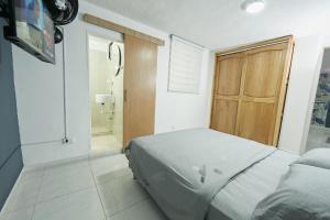 Postel nebo postele na pokoji v ubytování Casa Host 72