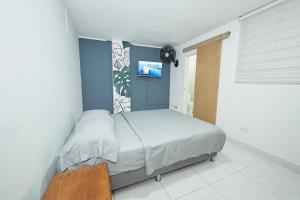 Postel nebo postele na pokoji v ubytování Casa Host 72