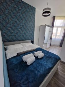 Un pat sau paturi într-o cameră la Milla's Dream Home