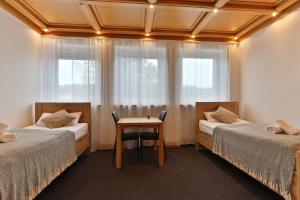 Postel nebo postele na pokoji v ubytování Moderne Ferienwohnungen - Service wie im Hotel