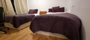 Postel nebo postele na pokoji v ubytování Fleetway Private Rooms