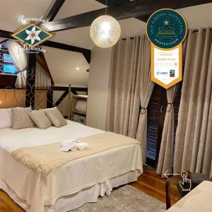 Ένα ή περισσότερα κρεβάτια σε δωμάτιο στο Edelweiss Pomerode