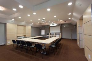 Kuchyň nebo kuchyňský kout v ubytování Hotel Trzy Światy Spa & Wellness Rajska WySpa