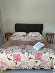 Giường trong phòng chung tại Pousada Chafariz