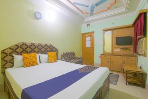 Vuode tai vuoteita majoituspaikassa SPOT ON Hotel Sagar