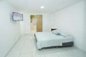 Postel nebo postele na pokoji v ubytování Casa Host 72