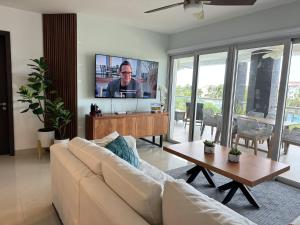 TV a/nebo společenská místnost v ubytování Mareazul Playa del Carmen