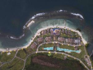 an aerial view of a resort in the water at A Hidden Gem in the Caribbean Paradise in María Grande