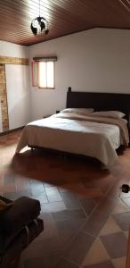 Ein Bett oder Betten in einem Zimmer der Unterkunft Finca los Alebrijes