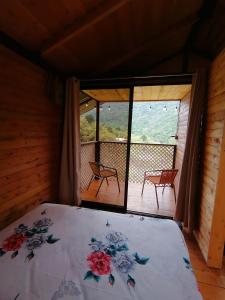 Ein Bett oder Betten in einem Zimmer der Unterkunft Mario's Lodge Providencia