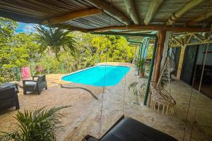 Bazén v ubytování Sundancefamily Paradise Villa nebo v jeho okolí