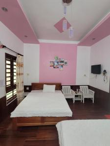 Giường trong phòng chung tại Hostel Ngọc Liên