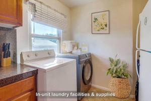 a kitchen with a washing machine and a refrigerator at Entire Private 3-Bedroom Home with Baby Crib, Wi-Fi & Laundry in San Diego