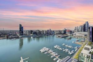 a view of a harbor with boats in the water at Wake Up in Front of Water Bay Beckons- 2B2B1C in Melbourne