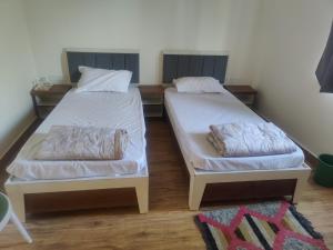 Łóżko lub łóżka w pokoju w obiekcie Green park