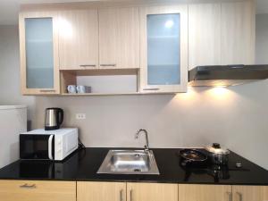 A cozinha ou cozinha compacta de The Cozy, 1 Bedroom Plus, Condo, Ayutthaya