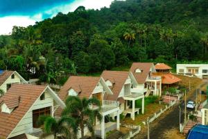 an aerial view of a row of houses at NEST RESORTS in Athirappilly