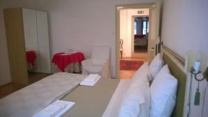 A bed or beds in a room at In Venice Back To San Marco tourist apartment