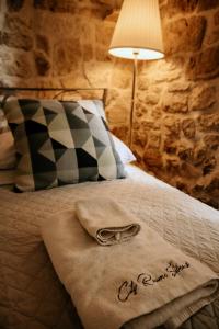 Кровать или кровати в номере City Rooms Šibenik