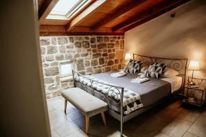 Кровать или кровати в номере City Rooms Šibenik