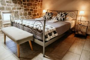 Кровать или кровати в номере City Rooms Šibenik