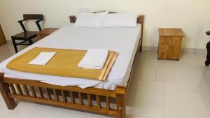 Postel nebo postele na pokoji v ubytování Pepper and Clove Enclave + 21 fotografií