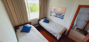 Postel nebo postele na pokoji v ubytování Seaview Condo B63