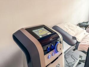 a hospital bed with a scale on top of it at Hotel & MedSpa Siret in Mamaia