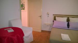 A bed or beds in a room at In Venice Back To San Marco tourist apartment