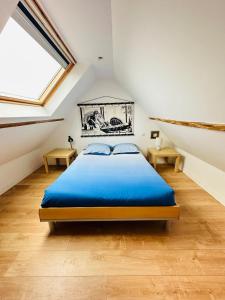 מיטה או מיטות בחדר ב-Lévasion maritime esprit cosy