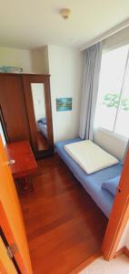Postel nebo postele na pokoji v ubytování Seaview Condo B63