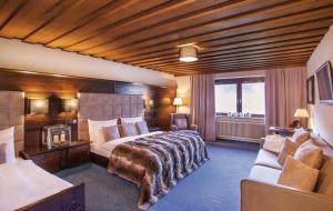 Postel nebo postele na pokoji v ubytování Boutiquehotel Säumler + 37 fotografií