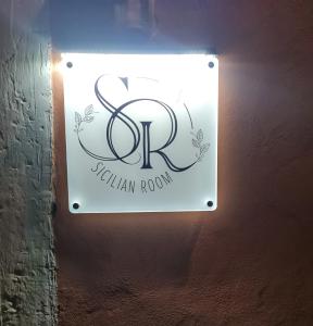 Πιστοποιητικό, βραβείο, πινακίδα ή έγγραφο που προβάλλεται στο Sicilian Room