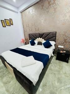 Hotel Sapphire Grand - Onyx Plaza房間的床