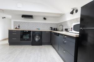 Cuisine ou kitchenette dans l'établissement Cocon à deux minutes de la mer.
