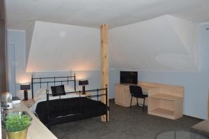 TV a/nebo společenská místnost v ubytování B&B Landrynka