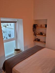 Postel nebo postele na pokoji v ubytování Romántico apartamento en el centro de Vejer