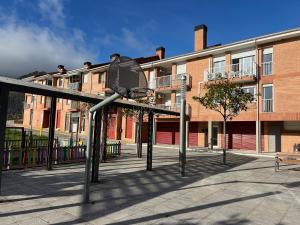 a basketball net in front of a building at Apartament reformat al Berguedà in Sant Jordi de Cercs